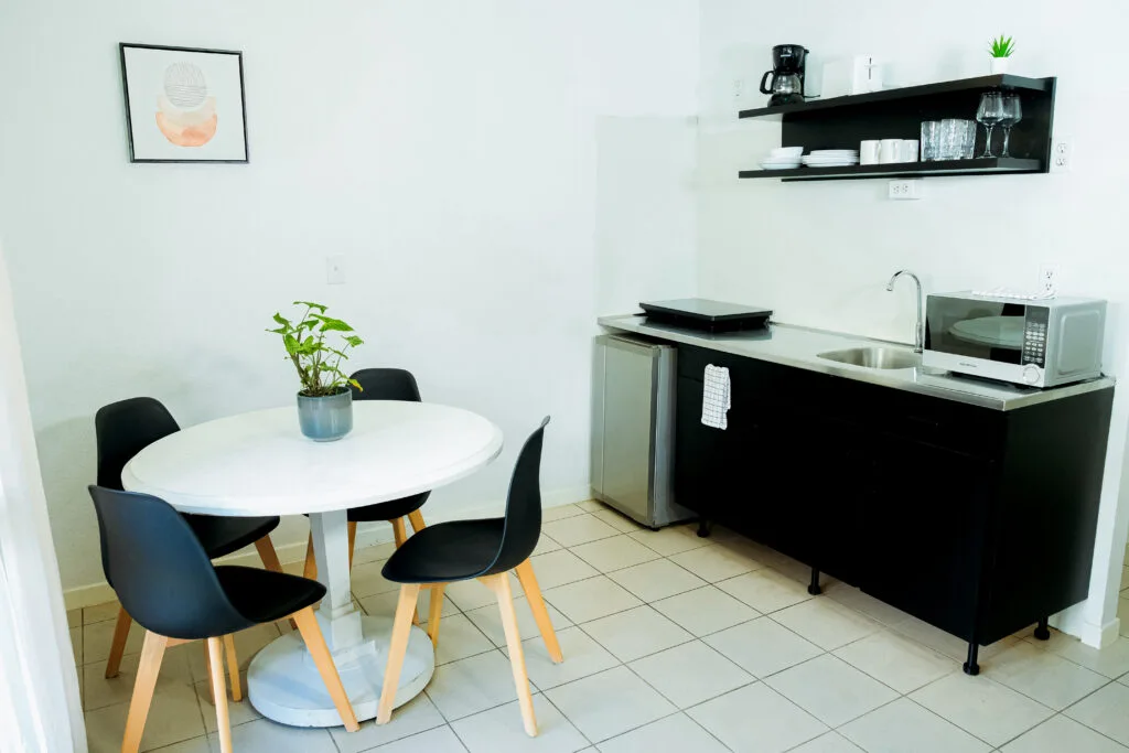 Premium apartment dining, kitchenette with compact fridge