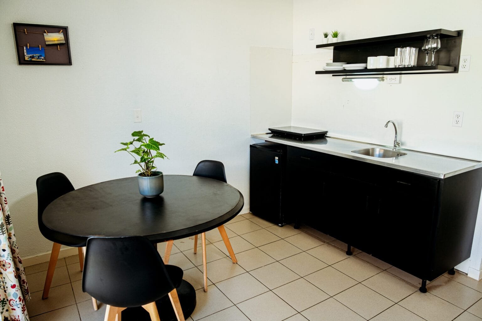 Economy apartment kitchenette and dining